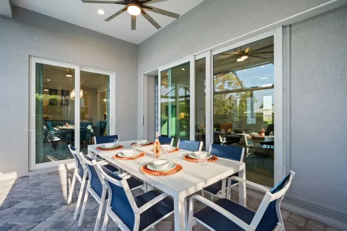 Dining Oasis: Enjoy alfresco meals with a view in this bright, stylish outdoor dining area!
