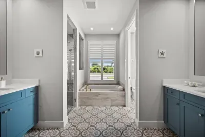 Luxury Bathroom: Bright and airy retreat with stunning views and chic coastal decor!