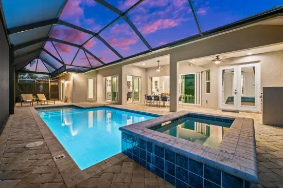 Outdoor Oasis: Dive into relaxation with a sparkling pool and stunning sunset views!