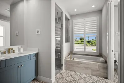 Master Bathroom: Elegant fixtures and serene views create your perfect retreat. Relax and rejuvenate!