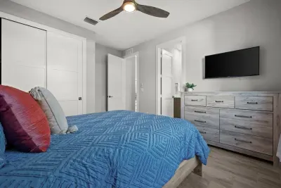 Bedroom Retreat: Stylish decor meets modern comfort in this relaxing Marco Island escape!