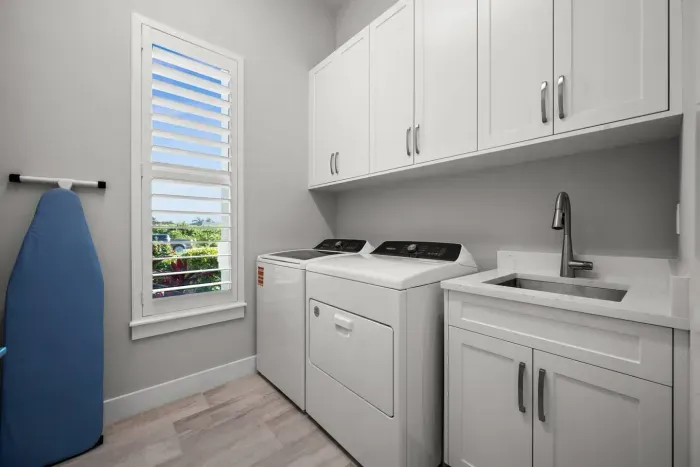 Laundry Room: Effortless laundry days with modern appliances and a bright, fresh vibe!
