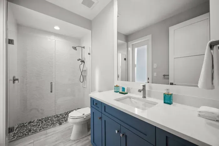 Bathroom Oasis: Immerse yourself in luxury with a sleek shower and vibrant décor!