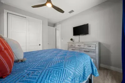 Bedroom Retreat: Vibrant colors and modern design create a perfect escape for relaxation!