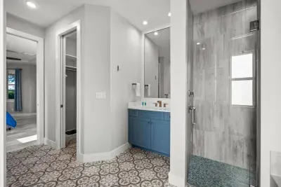 Spa-Like Bathroom: Refresh in a modern retreat with stylish finishes and ample natural light!