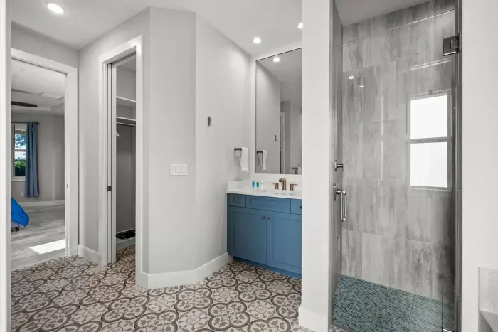 Spa-Like Bathroom: Refresh in a modern retreat with stylish finishes and ample natural light!