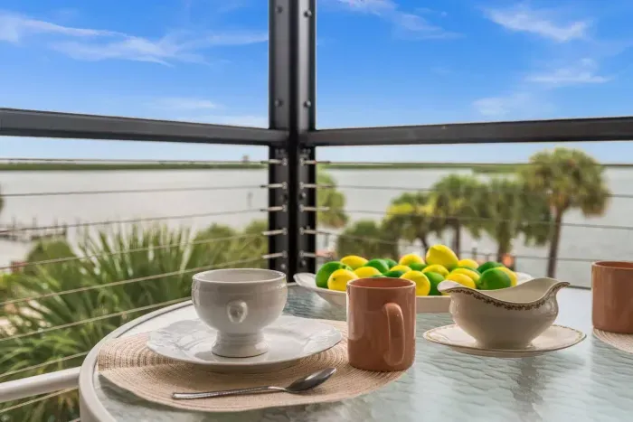 Balcony Dining: Sip morning coffee with stunning bay views!