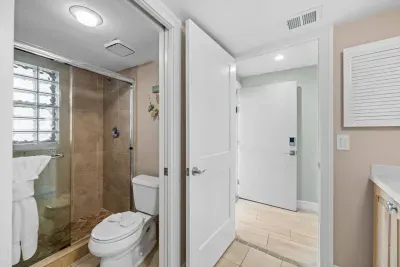 Bathroom Retreat: Enjoy a chic shower surrounded by stylish tile and modern fixtures!