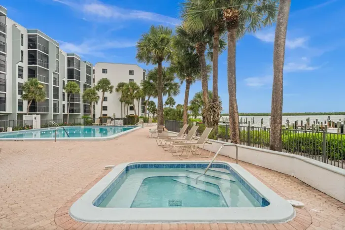 Poolside Paradise: Dive into relaxation by the lush palms and sparkling waters of your retreat!