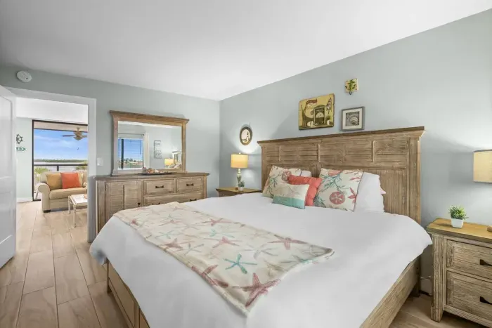 Bedroom Retreat: Drift off in a spacious haven adorned with beachy accents and serene views!