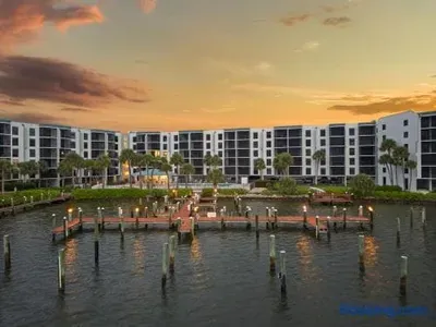 Exterior View: Experience stunning views by the water, with pools and marinas at your doorstep!