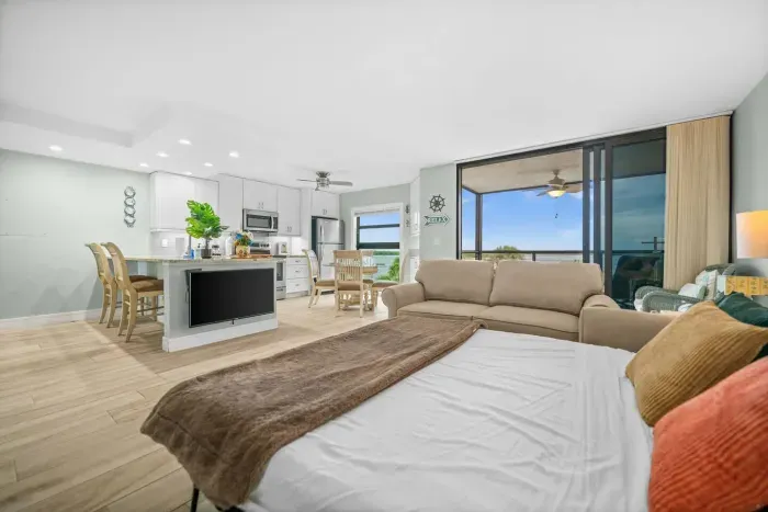 Living Room: Bright and airy space with stunning views and pull out sofa.
