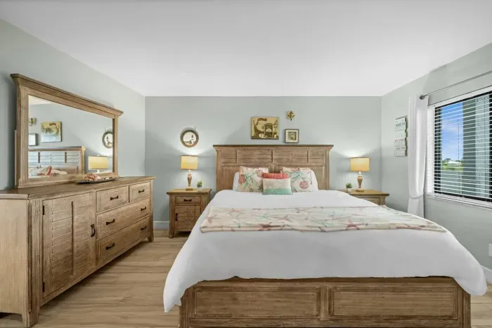 Master Bedroom: Relax in style with soft hues, elegant furnishings, and natural light!