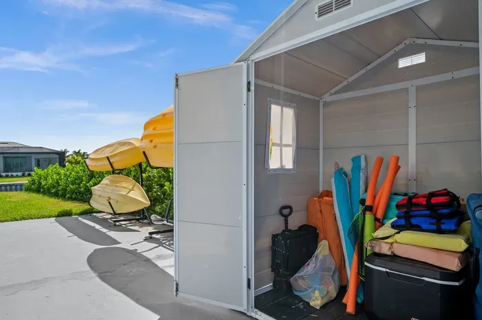 Outdoor Gear Ready: Kayaks and gear await your next seaside adventure in sunny Marco Island!
