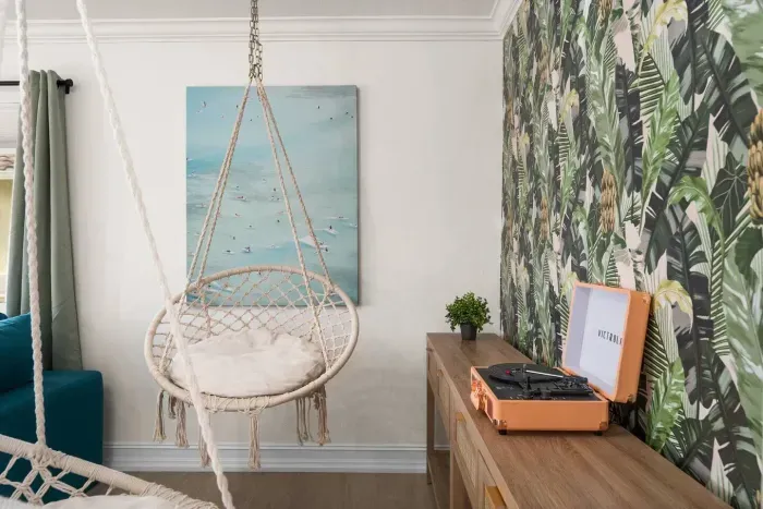Hammock Haven: Swing into relaxation with tropical decor and a vintage record player!