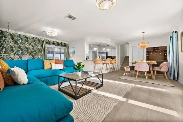 Living Room: Bright and airy, with vibrant decor and inviting seating for unforgettable gatherings!