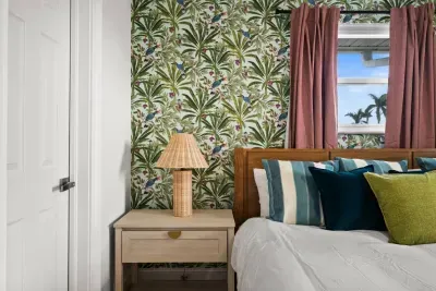 Tropical Retreat: Vibrant decor, plush pillows, and views to inspire your island adventure!