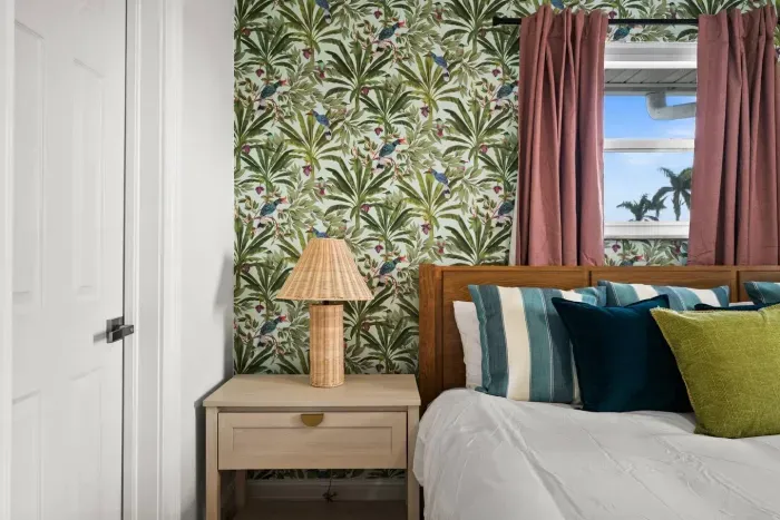 Tropical Retreat: Vibrant decor, plush pillows, and views to inspire your island adventure!