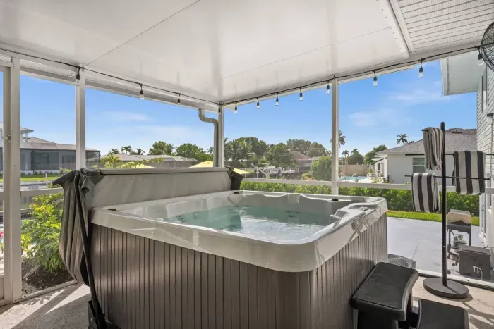 Spa Retreat: Unwind in your private hot tub with stunning views of tropical paradise!