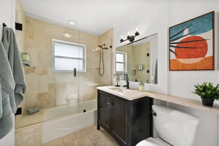 Spa-like Retreat: Elegant bathroom with a spacious shower and stylish decor await your relaxation!