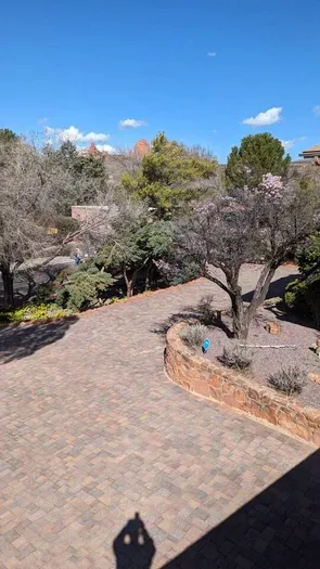 Massive front driveway. Could park a large RV on it or just park your ride in style.