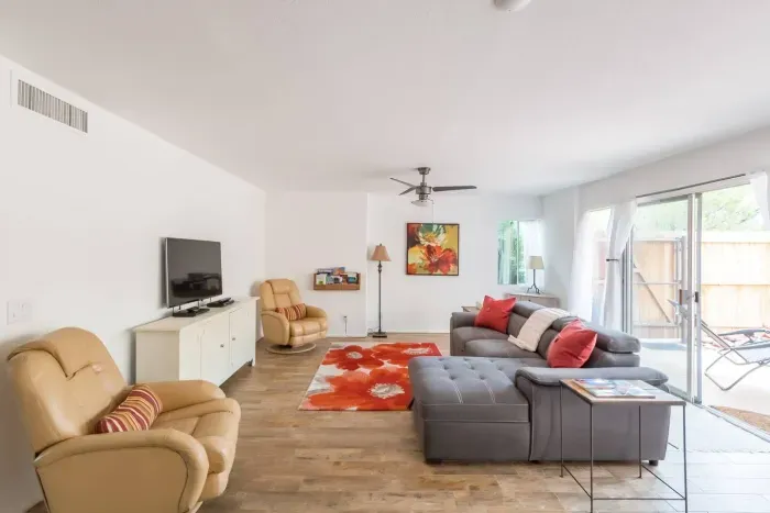 Living area. Couch pulls out to reveal storage and another sleeping area.