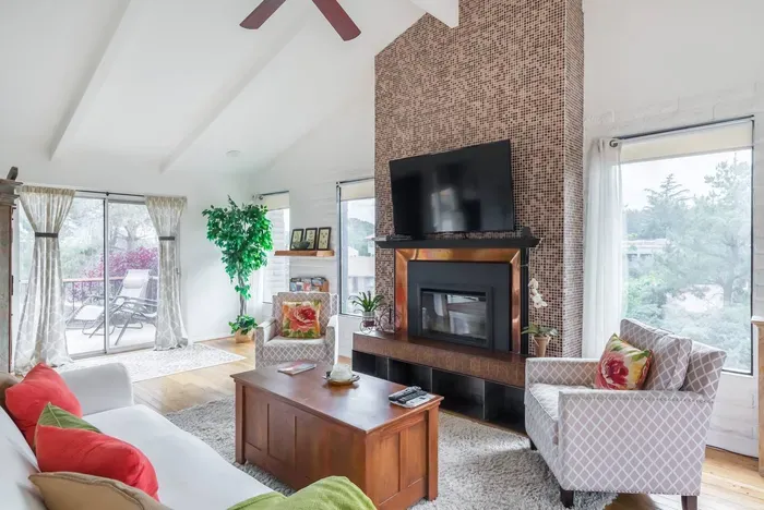 Another view of the living room. A blow up mattress is located in the living room table