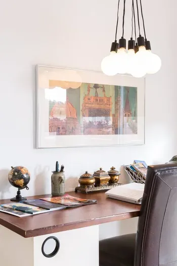 Desk with magazines and guest binder