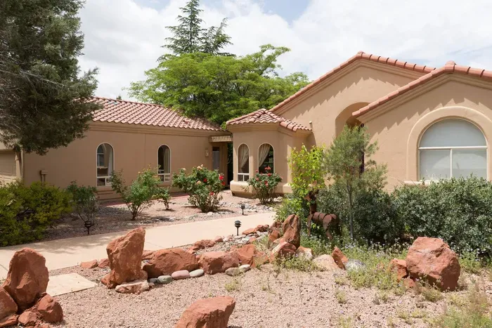 Main home on right & detached casita on left