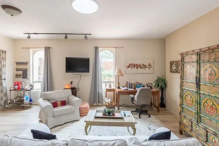 Main sitting area with desk to work/ read with high speed Internet