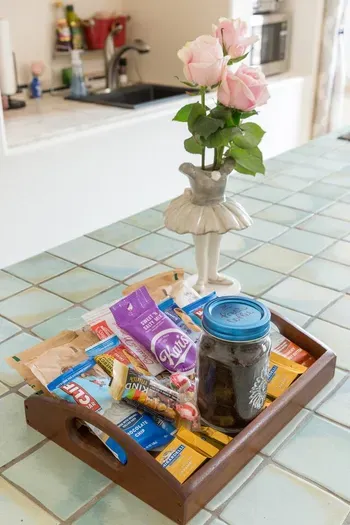Complimentary snack tray with fresh coffee and roses