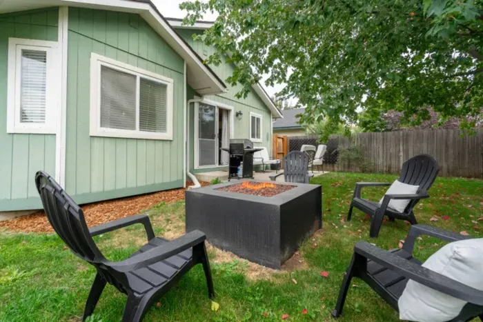 Relax in the back yard around a fire pit