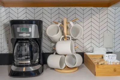 Selection of coffee, tea, creamer and sugar provided