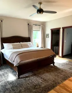 Comfortable bedroom with DreamCloud mattresses and cozy bedding near Silverwood Theme Park by CDAstay