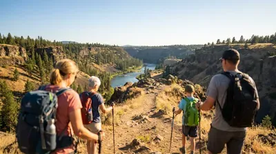 Family hiking through a canyon in Post Falls, Idaho