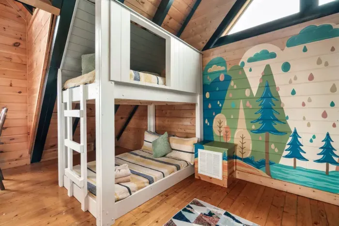 Loft has a bunk bed (we have added a slide since this photograph was taken)