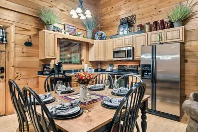 Kitchen with all modern appliances needed to enjoying home cooked meals. Our dining table seats 5.