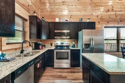 Full kitchen with modern appliances. We provide all the essentials necessary to enjoy a home cooked meal.