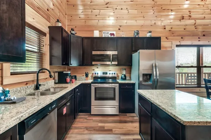 Full kitchen with modern appliances. We provide all the essentials necessary to enjoy a home cooked meal.