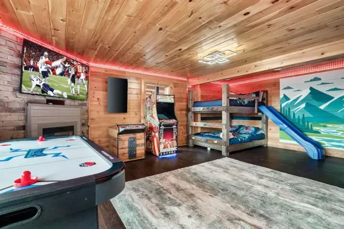 Awesome game room with Queen over Queen bunk beds