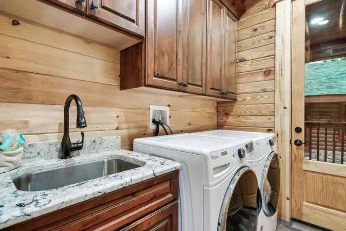 Full laundry room with washer and dryer