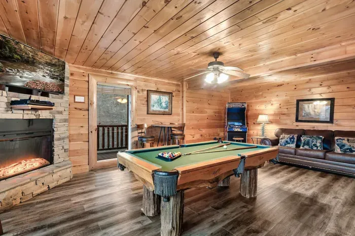 Enjoy the fireplace while playing a game of pool