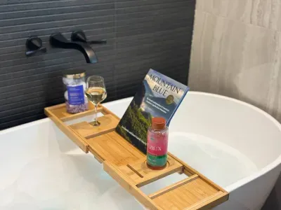 You can even indulge in a luxurious soaking bathtub in the downstairs bathroom, the perfect way to unwind and relax during your vacation.