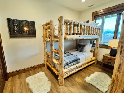 Each bed is equipped with a luxurious twin XL Leesa mattress, topped with soft bedding and cozy pillows for ultimate comfort.  The nightstand also provides plenty of charging ports.