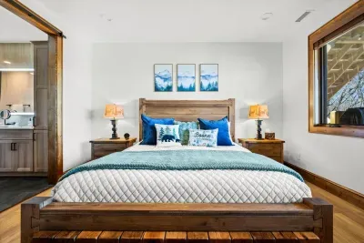 Two spacious nightstands with charging ports, and a large dresser.