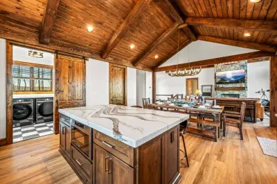 The open concept kitchen/dining/living room offer the perfect space for family and friends to gather together.