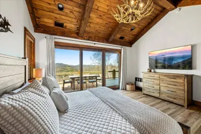 Imagine waking up, pulling open the curtains, and greeting stunning, unobstructed mountain views. Step outside through oversized sliding glass doors with your morning coffee and soak in the peaceful scenery, far from the worries of everyday life.