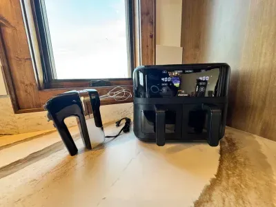 Fully stocked with all the kitchen essentials for enjoying a meal with family and friends including a dual sided air-fryer!