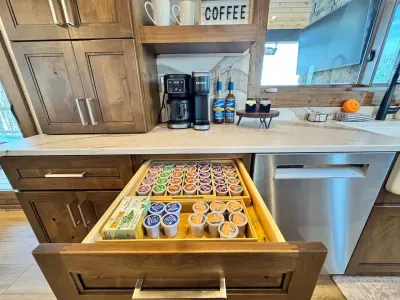 Fully stocked coffee bar with Keurig pods, Nespresso pods, (not shown) tea and hot chocolate.