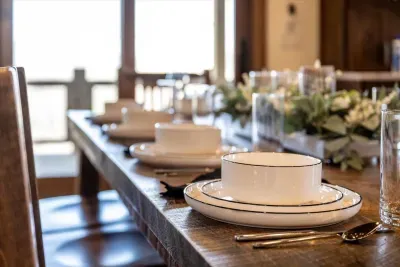 A set of 12 beautiful white dishes is provided for a perfect meal.